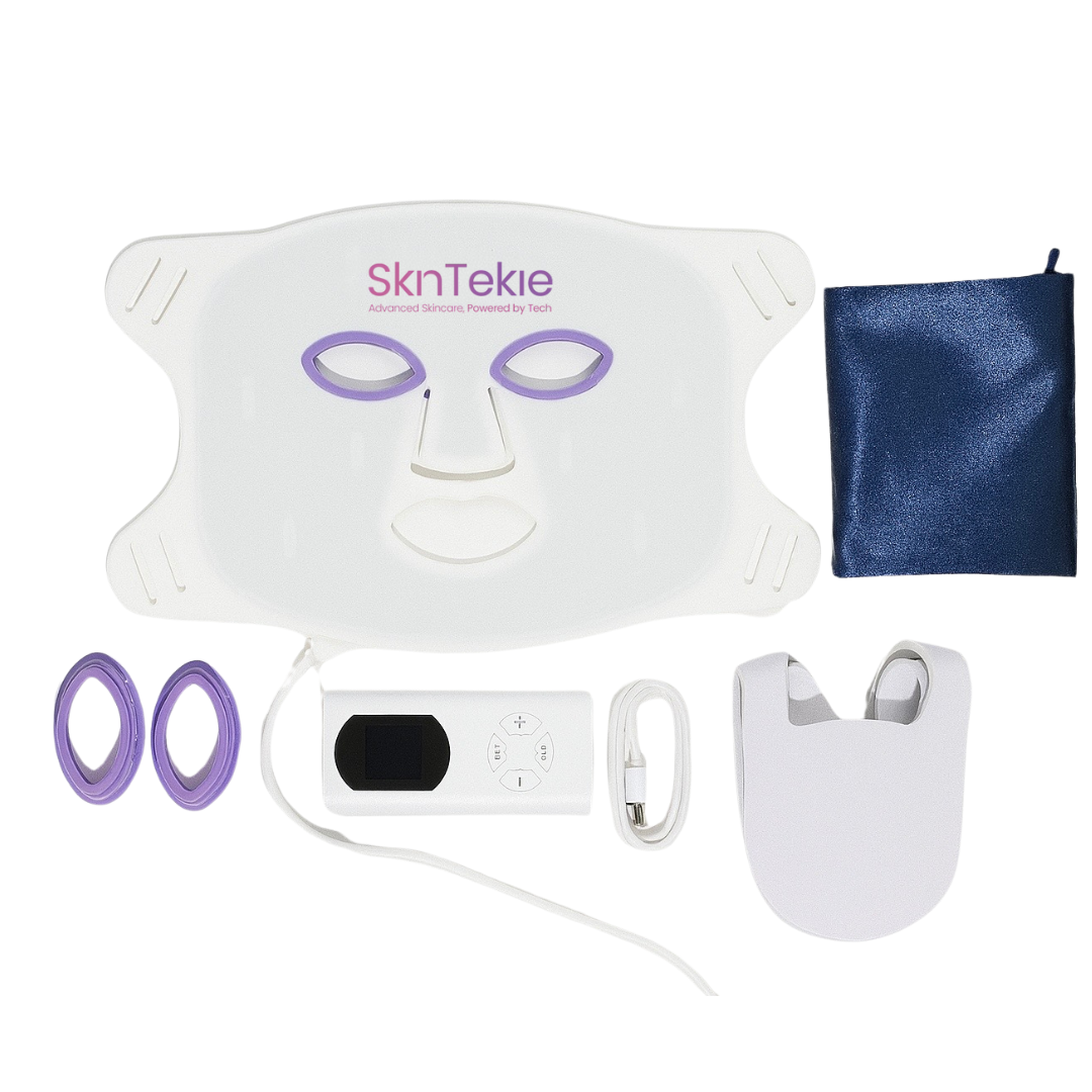 Complete Skintekie LED Face Mask kit with goggles, remote, strap, charger, and bag
